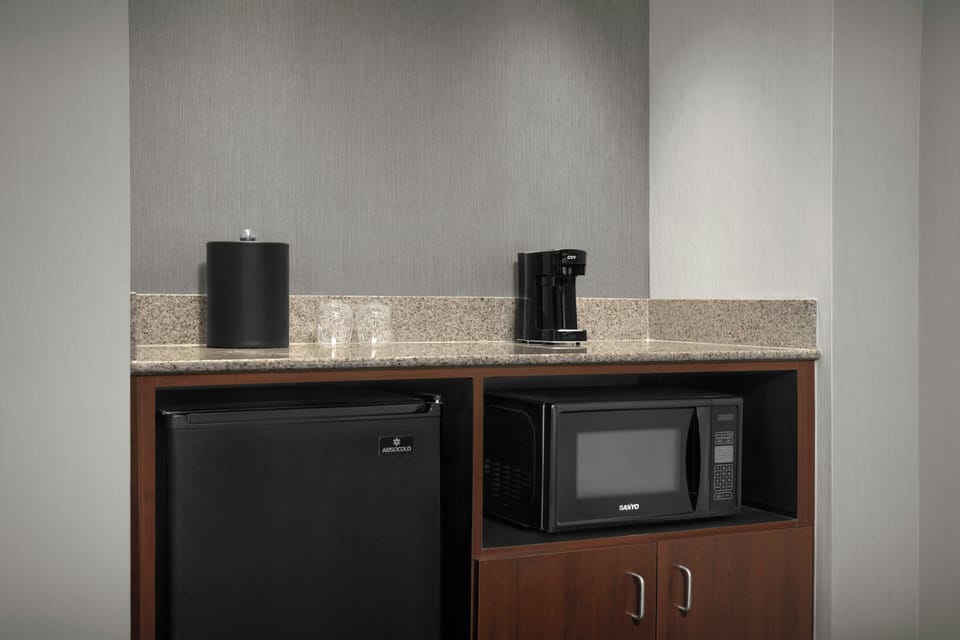 Premium bedding, down comforters, pillowtop beds, in-room safe