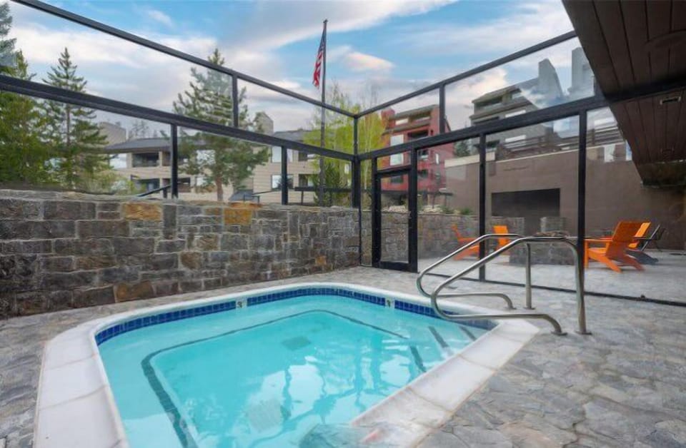 Slip the clubhouse hot tub sanctuary, surrounded by glass walls and stone elegance for the ultimate relaxation escape.
