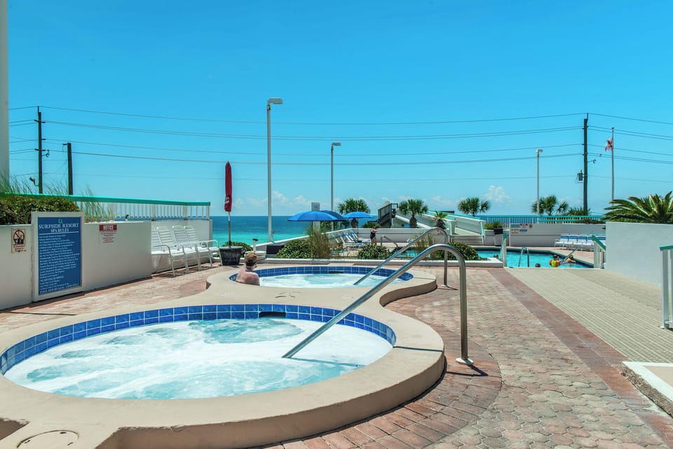 Dual hot tubs and pool at Surfside 