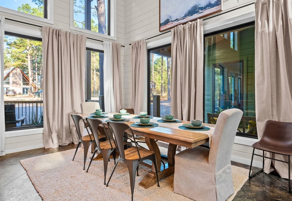 Large windows surround the dining area, creating a bright and welcoming place to share breakfast before another day of adventure.