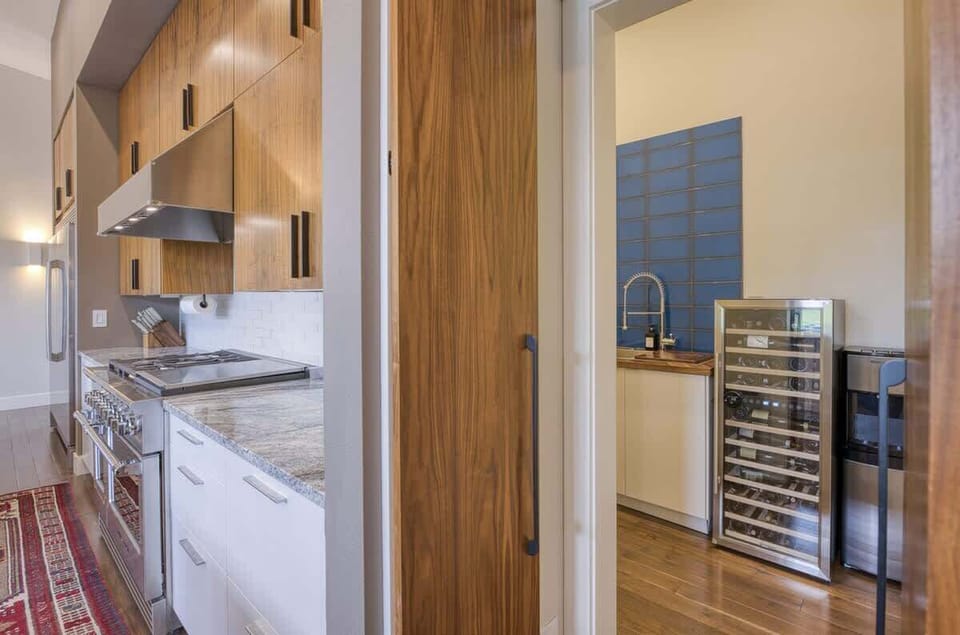 Butler’s pantry with wine fridge and additional prep space.