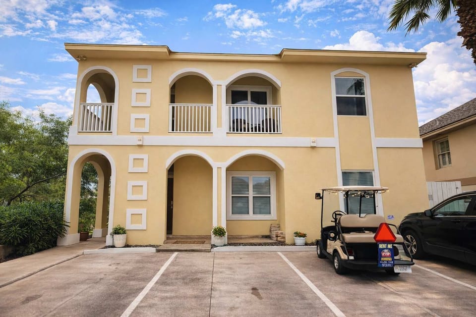 Sunny 2BR Coastal Retreat w/ Parking + Golf Cart Rental – Walk to Beach, Dining & Shops