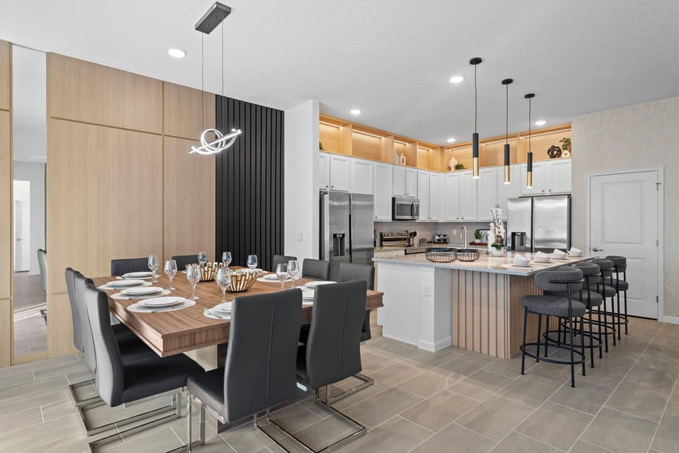 With a modern design and plenty of comfort, the dining table seats 10 guests.