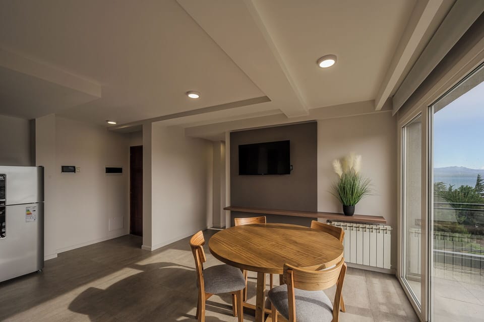 Deluxe Apartment, 1 Bedroom, Balcony, City View | Living area | 40-inch Smart TV with cable channels, Netflix, pay movies