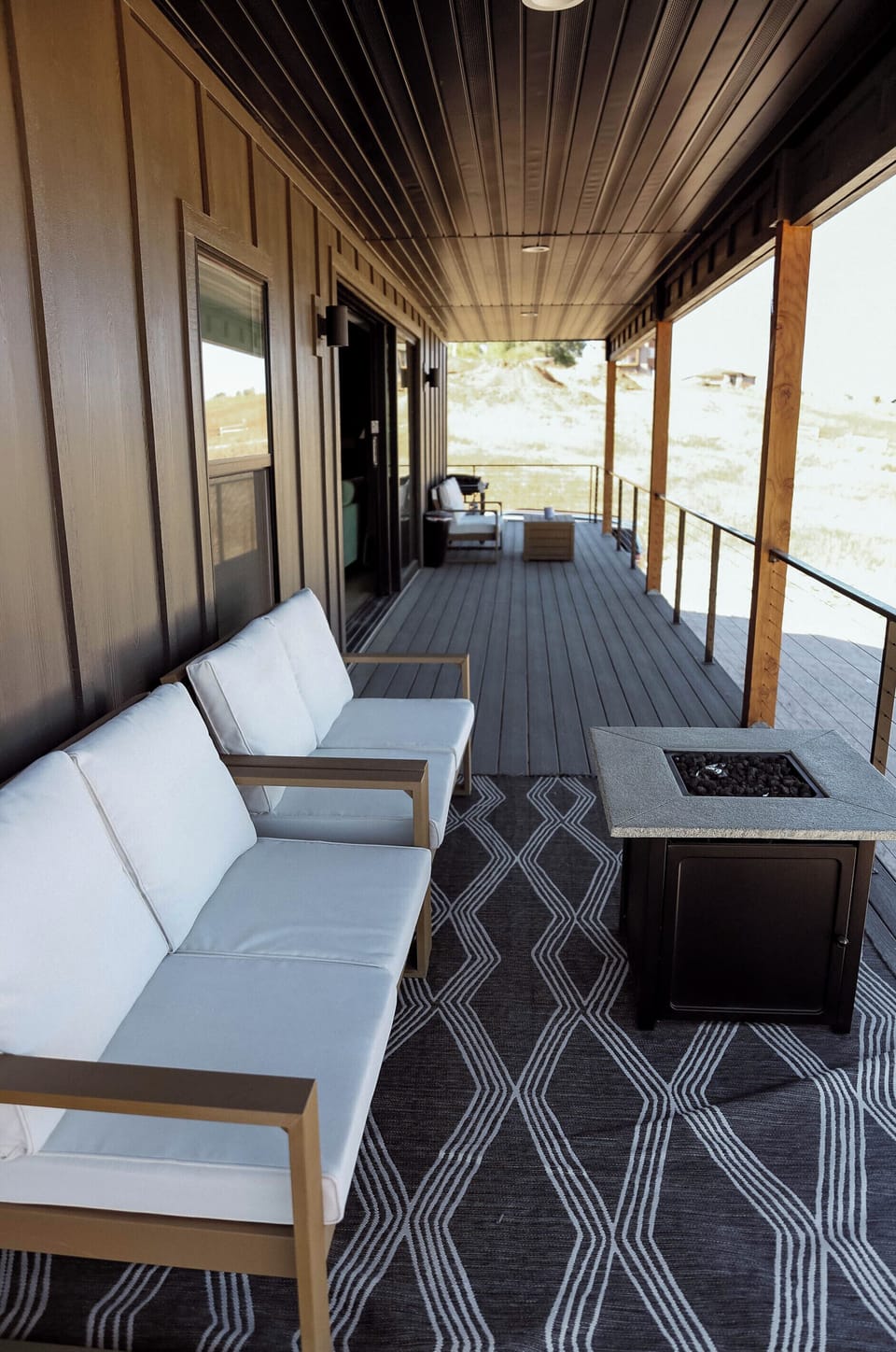 Enjoy the gorgeous view with this huge porch and fire pit. Huge sliding door!