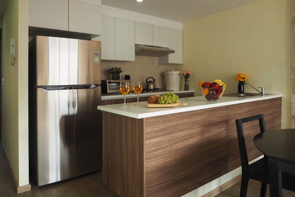 Deluxe Apartment, Balcony, Park View | Private kitchen | Coffee/tea maker