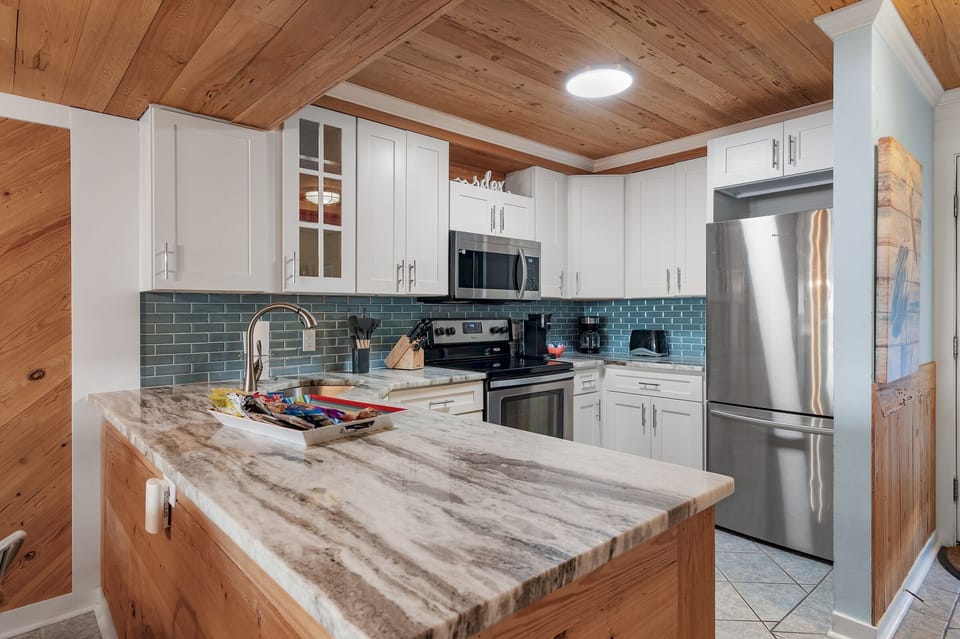 Cook delicious meals in the REMODELED Kitchen while overlooking the Gulf of Mexico