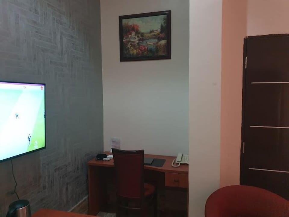Family Apartment, Balcony, City View | 2 bedrooms, desk, laptop workspace, blackout drapes