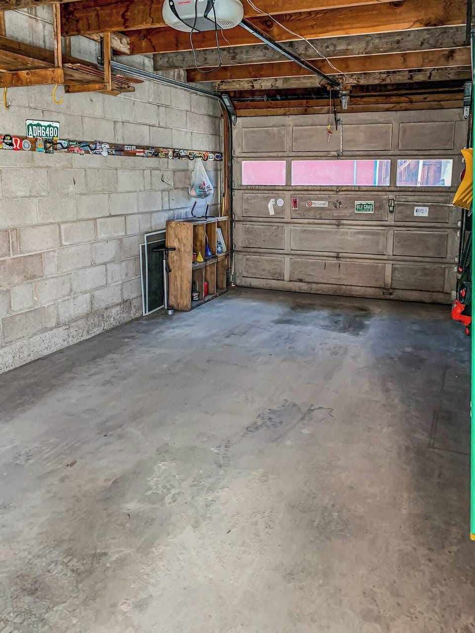 The garage provides convenient and secure parking, offering extra storage space and easy access to the home.