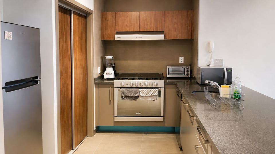 Enjoy the convenience of a fully stocked kitchen with everything you need to prepare meals, plus a dishwasher for easy cleanup.