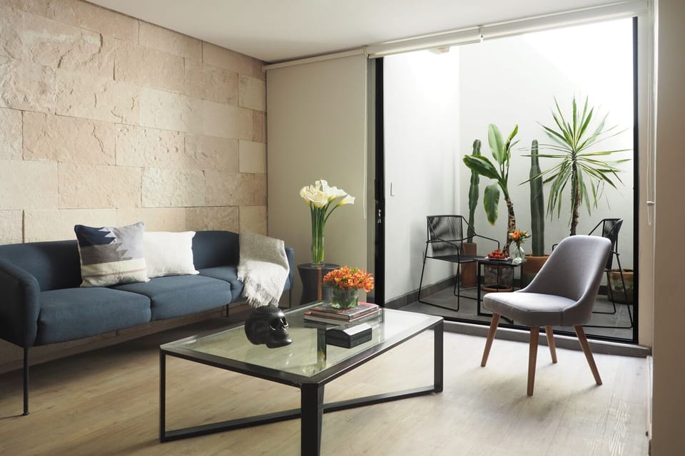 Exclusive Apartment, Balcony, Garden View | Living area | 42-inch Smart TV with digital channels