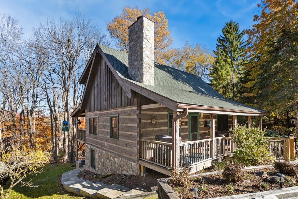 Front of Silver Rock Lodge with Covered Front Porch and Stone Steps to the Lower Patio