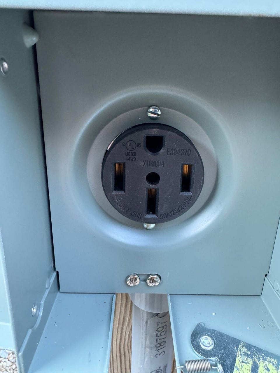 EV charging (NEMA 14-50 plug near parking area)