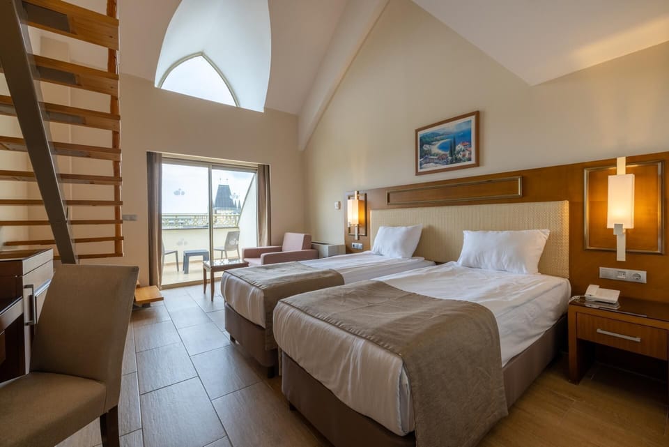 Premium bedding, free minibar, in-room safe, desk