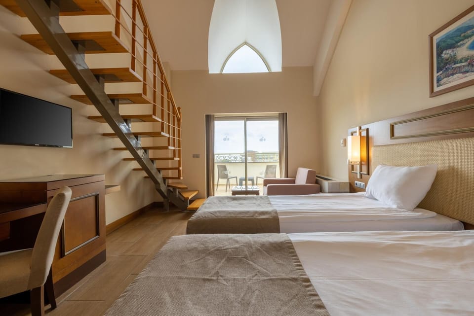 Premium bedding, free minibar, in-room safe, desk