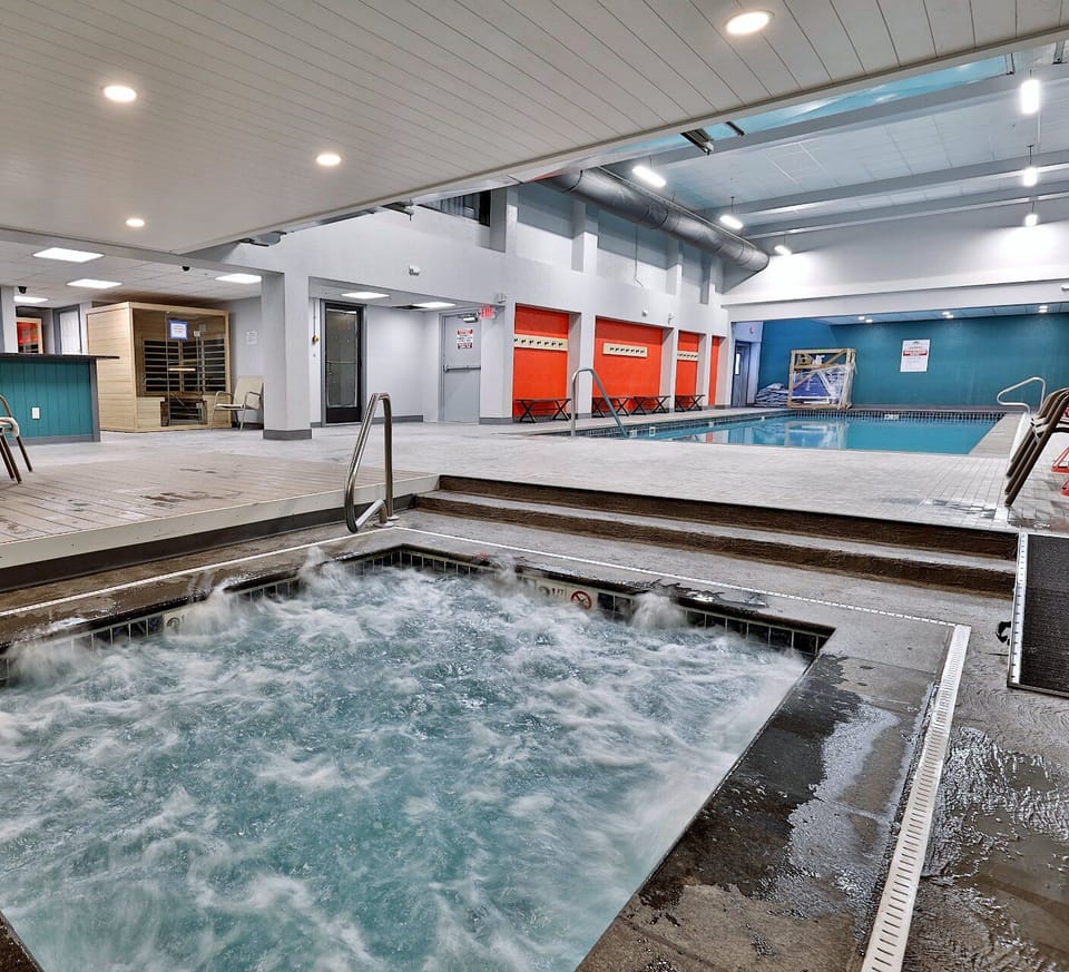 The resort's indoor hot tub is beside the pool, so a swim and a soak fit into the same visit.