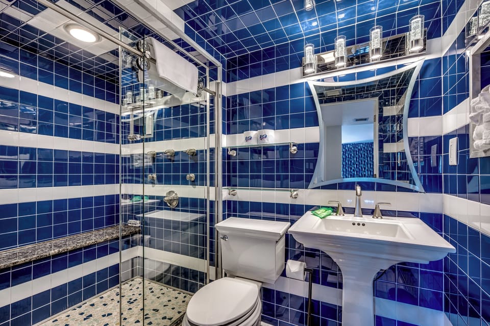 Vibrant bathroom with bold blue tile design