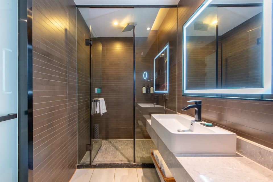Design Double Room | Bathroom | Hair dryer, slippers, towels, soap