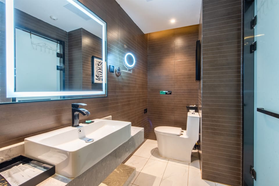 Design Double Room | Bathroom | Hair dryer, slippers, towels, soap