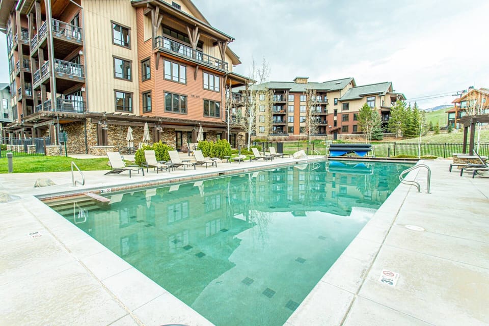 Deck chairs are ready for you to unwind by the water.