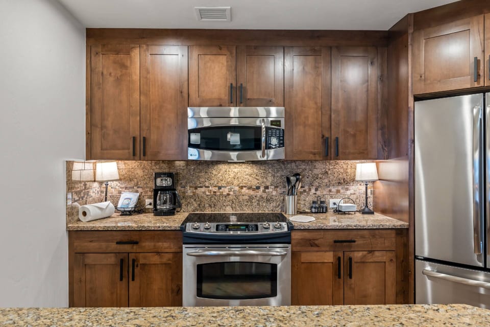 granite countertops and full kitchen to the steaming outdoor spa, this is luxury mountain living.