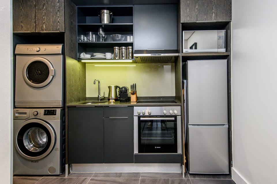 Superior Suite, 1 King Bed, Ensuite | Private kitchen | Fridge, microwave, oven, stovetop
