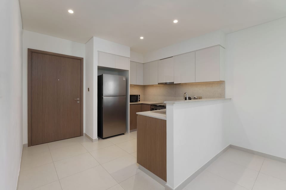 Deluxe Apartment, 2 Bedrooms, Balcony | Private kitchen | Coffee/tea maker, electric kettle