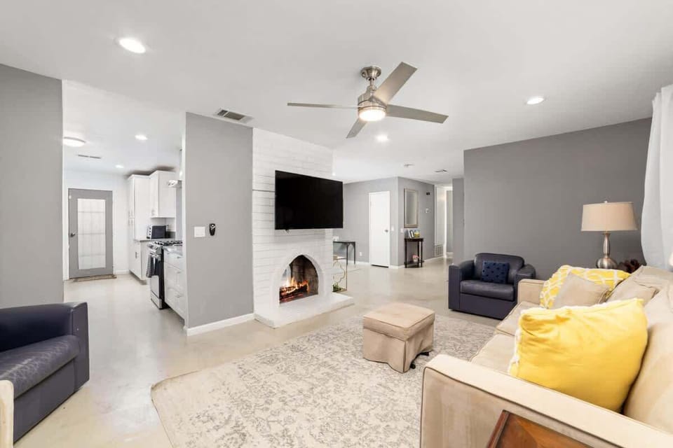 Spacious living area with comfortable seating and natural light