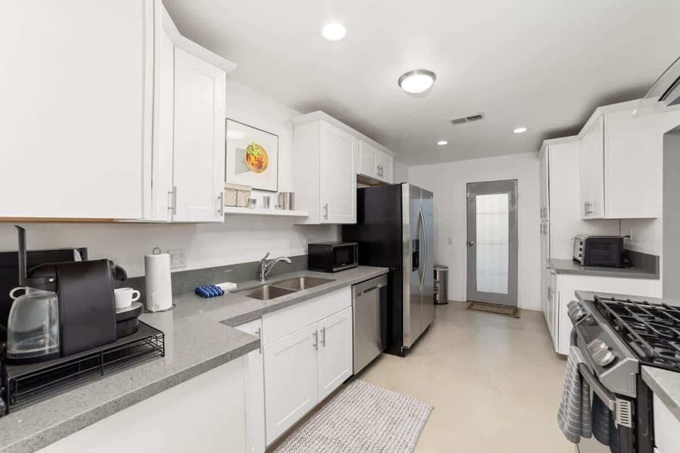 Fully equipped kitchen with stainless steel appliances