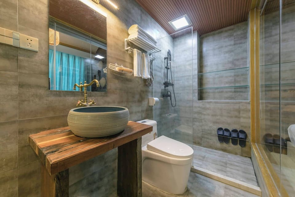 Basic Double Room, Partial Ocean View | Bathroom | Shower, hair dryer, towels, soap