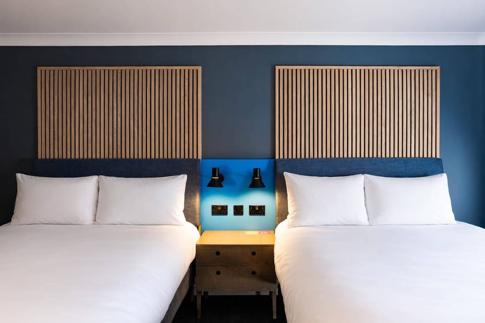 Family Room, 2 Double Beds | Desk, laptop workspace, blackout drapes, iron/ironing board