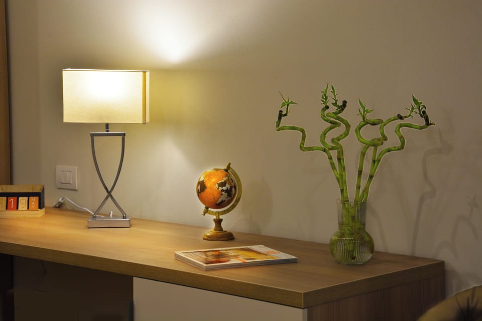 Executive Apartment | Living area | 35-inch Smart TV with digital channels