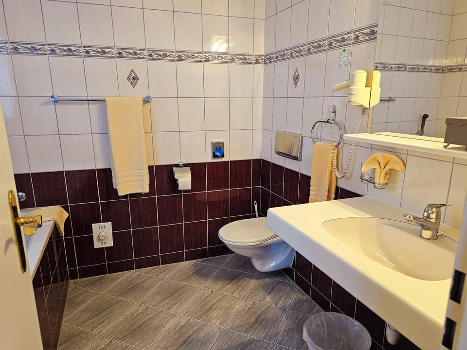 Hair dryer, towels, soap, shampoo