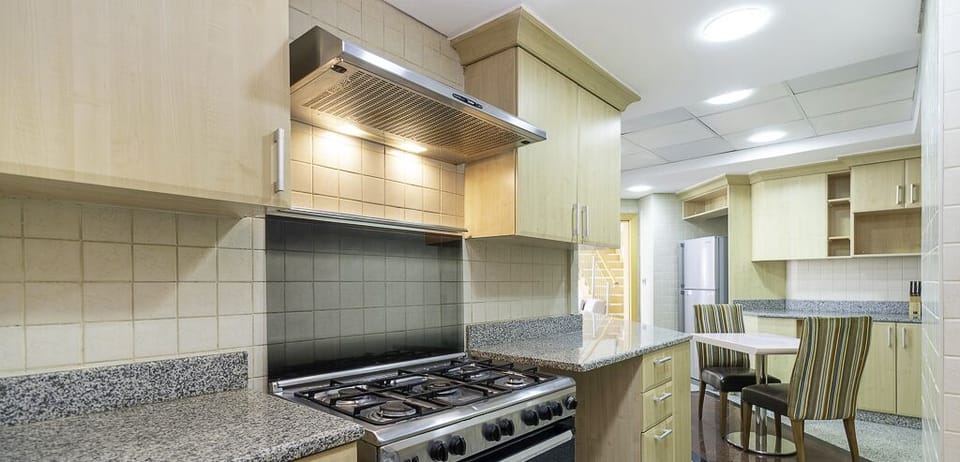 Penthouse, Balcony, Partial Sea View | Private kitchen | Electric kettle, toaster