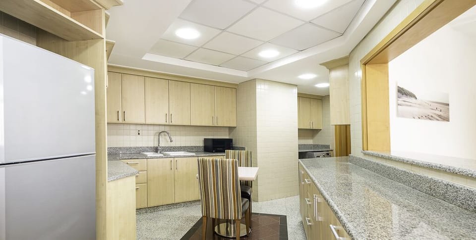 Penthouse, Balcony, Partial Sea View | Private kitchen | Electric kettle, toaster