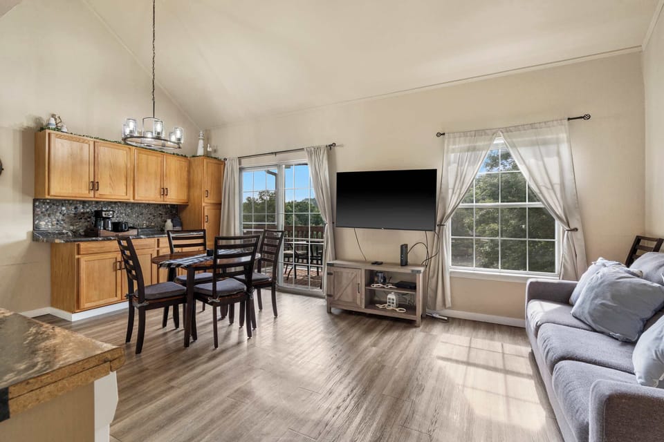 Curl up in the open living room & stream your favorites on the smart TV