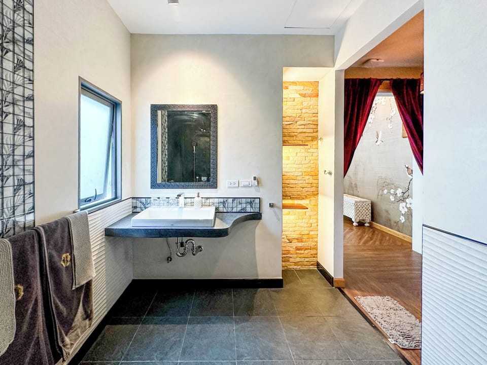 Deluxe Family Room | Free minibar, in-room safe, individually decorated, desk
