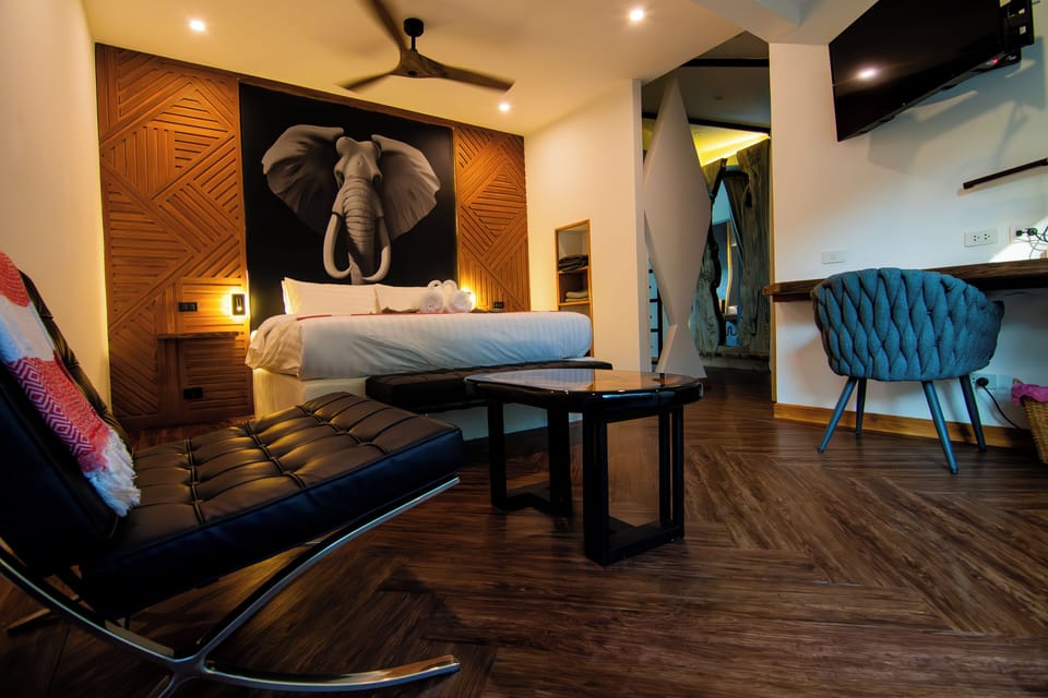 Deluxe Triple Room | Free minibar, in-room safe, individually decorated, desk