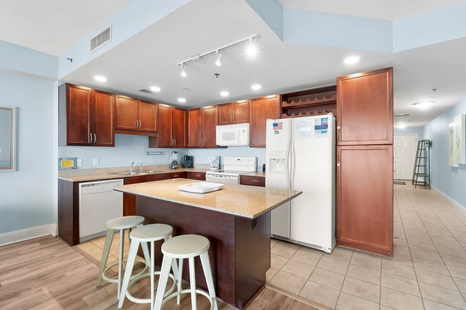 Modern kitchen with a central island and wooden cabinetry