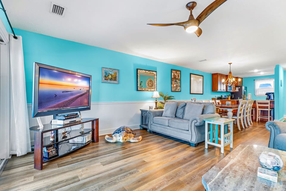 Open concept living between the kitchen, loving rom, and dining areas