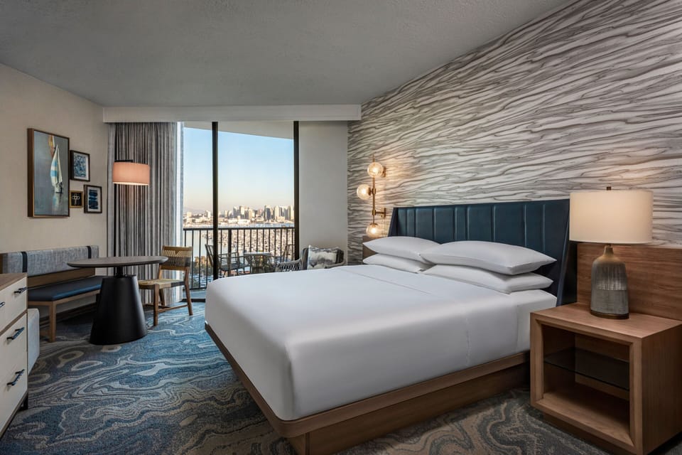 Premium bedding, down comforters, in-room safe, desk