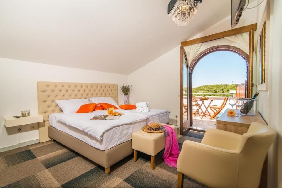 Economy Double or Twin Room, Balcony, City View | In-room safe, desk, blackout drapes, free WiFi