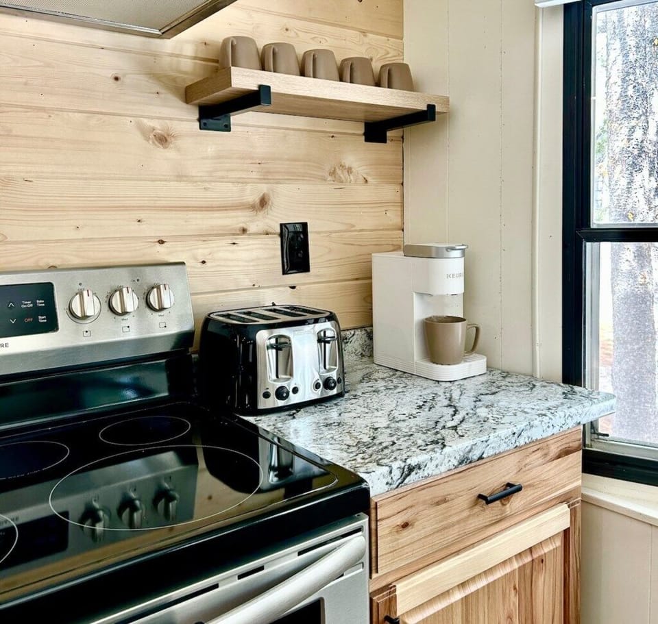 Full size kitchen, equipped with many amenities. 