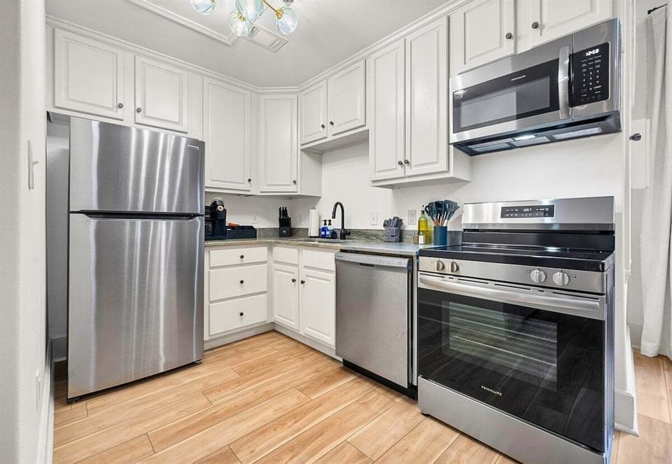 This bright and modern kitchen has all the essentials to make dining in a delightful part of your stay.