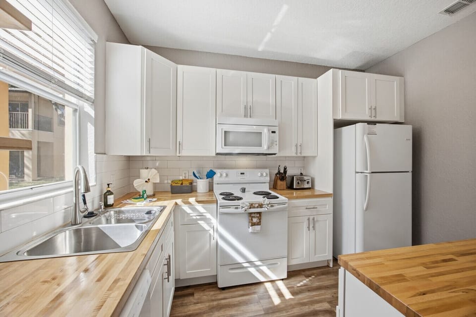 Bright kitchen with modern appliances and plenty of counter space.