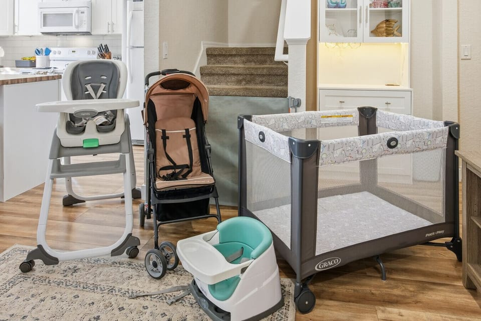 Fully equipped for little ones with pack n` play, stroller, and high chair for a stress-free stay.
