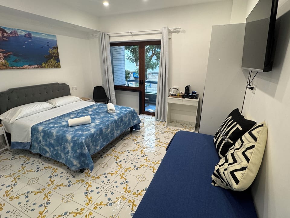 Superior Room, Balcony, City View | Minibar, desk, soundproofing, iron/ironing board