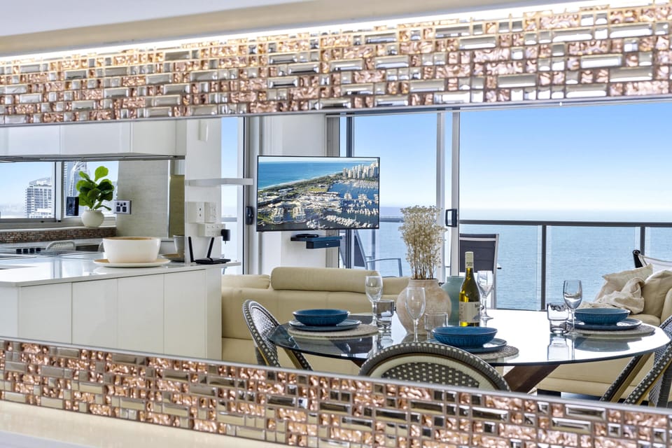 Dining area is right next to the balcony overlooking the ocean