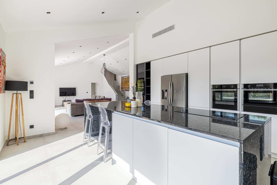 Villa | Private kitchen | Fridge, microwave, oven, stovetop