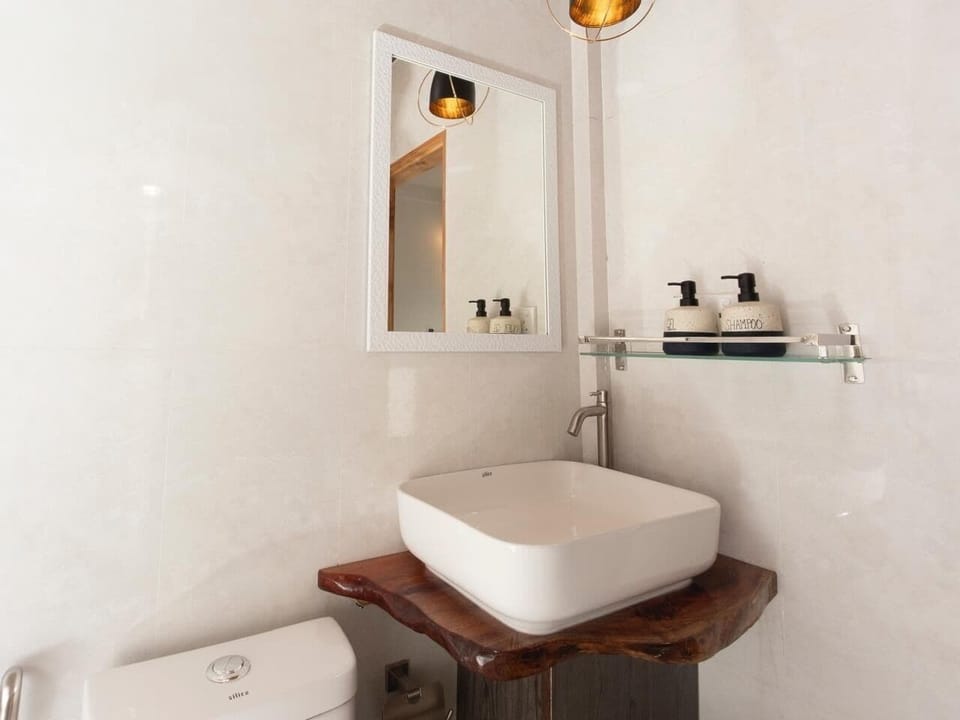 Deluxe Duplex, Balcony, City View | Bathroom | Free toiletries, bathrobes, slippers, towels